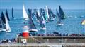 The 53 boat fleet crosses the starting-line off Wicklow Pier on Saturday in fine conditions ahead of their 704 nautical-mile Round Ireland Race &copy; David Branigan / Oceansport