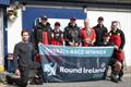 Khumbu skipper Guy Gillon (centre) with Kyran O'Grady, Race Director with Wicklow Sailing Club with the trophies for line honours and overall victory in the 704 nautical-mile Round Ireland Race &copy; David Branigan / Oceansport