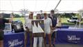 (L to R) `Chestnut crew Libby Toppa, Kahane, Alie Toppa, Brad Read, Sail Newport executive director - 2026 Annual Newport Regatta &copy; Daniel Forster Photography