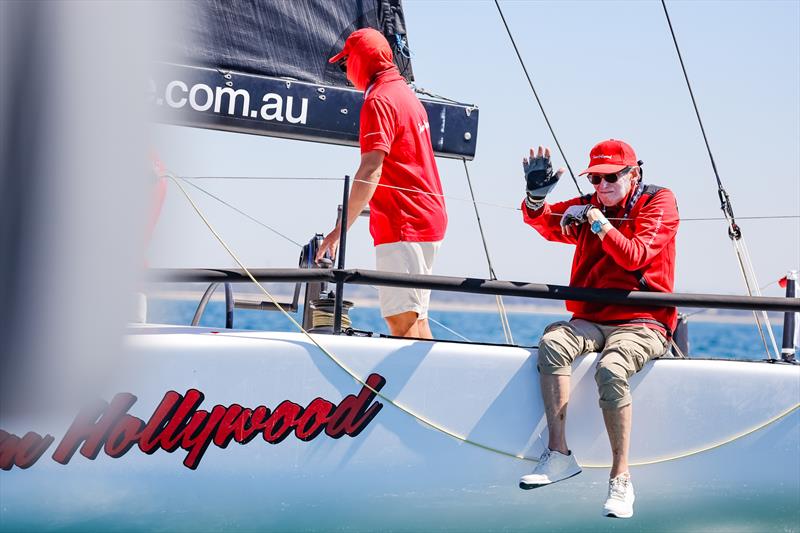 Ray Roberts waves from onboard with Hollywood during the Holiday Inn & Suites Geelong Passage Race at the Festival of Sails 2026 photo copyright Salty Dingo taken at Royal Geelong Yacht Club and featuring the IRC class