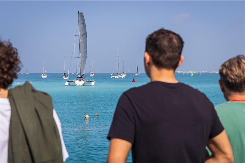 Spectators bid farewell to the fleet from shore photo copyright Mikey Brignall / DOSC / DIMC taken at Dubai Offshore Sailing Club and featuring the IRC class