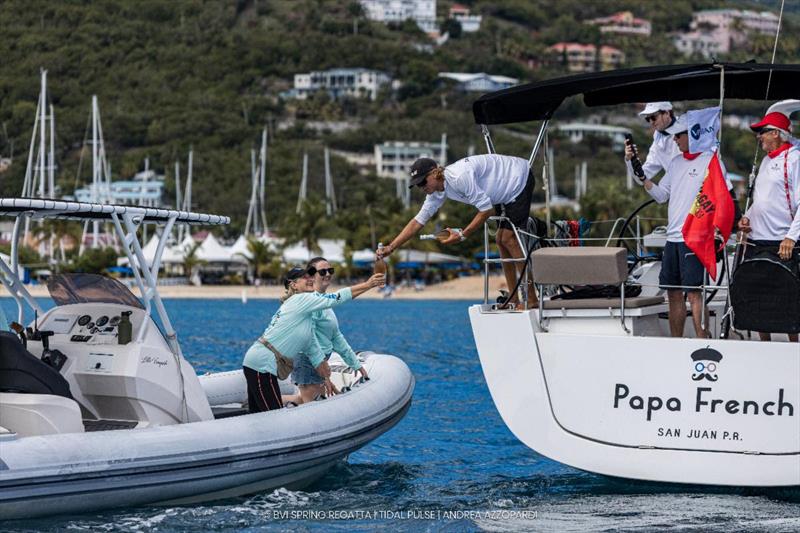 Welcoming back crews with an ice cold bottle of bubbles after racing on day 2 - 2026 BVI Spring Regatta & Sailing Festival - photo © Tidal Pulse / Andrea Azzopardi