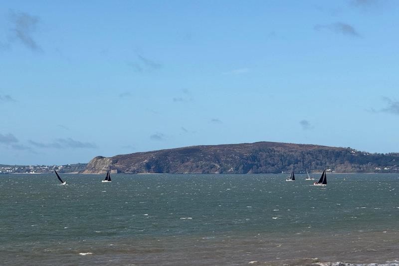 The fleet approaching the Sponsorship available mark at the west end - Easter 2026 at Pwllheli - photo © Victoria Cox