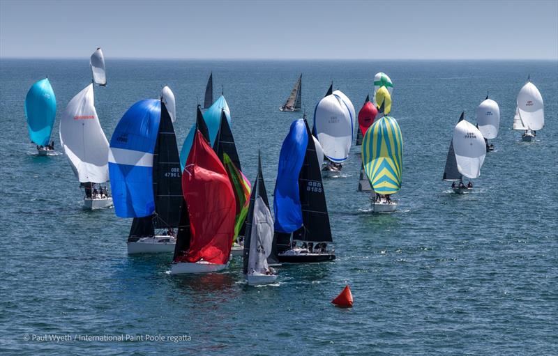 Busy mark rounding on Saturday at the International Paint Poole Regatta 2026 - photo © Paul Wyeth / www.pwpictures.com
