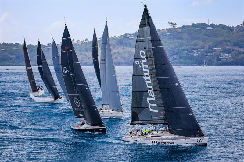 Ikon (white yacht behind Maritimo) at the Australian Sailing Champs in 2022 - photo © Salty Dingo / Hamilton Island Race Week