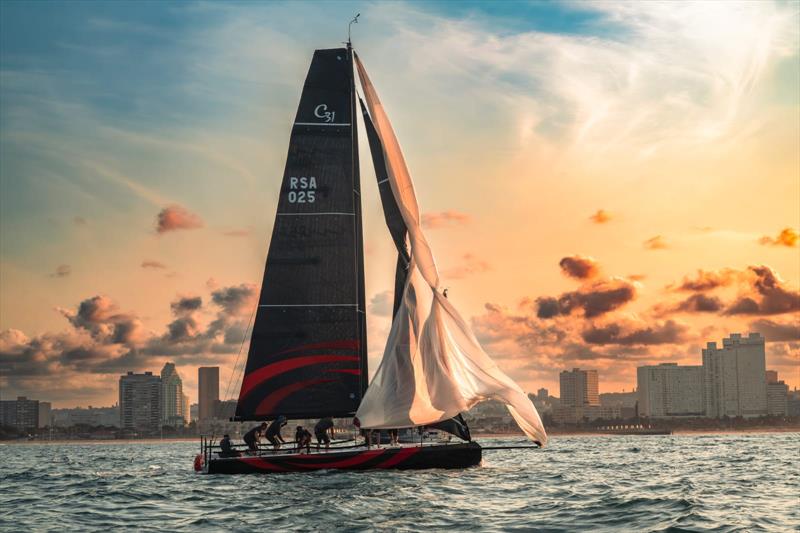 A busy cockpit as TNT Racing hoists their spinnaker on day four of the 49th running of the MSC Week hosted by Point Yacht Club. Four short races were run on the fourth day with TNT Racing earning three firsts and a second on handicap - photo © Shane Elliott