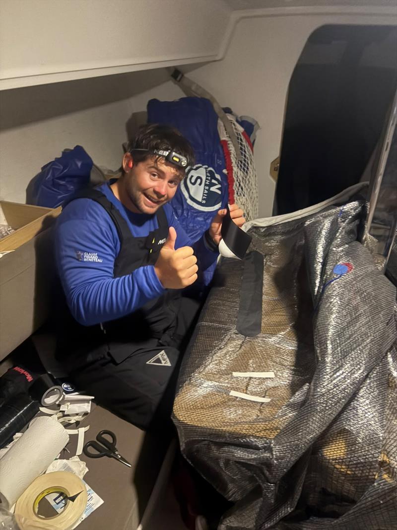 Joe Griffiths tackles sail repairs on board - RORC Round Britain and Ireland Race 2026 - Day 9 - photo © Bellino