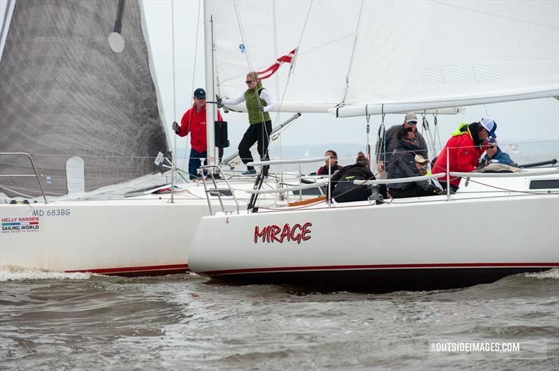 Cedric Lewis and Fredrik Salvesen's team on the J/105 Mirage round a racemark at the Helly Hansen Sailing World Regatta Series in Annapolis photo copyright Paul Todd / Outsideimages.com taken at Annapolis Yacht Club and featuring the J105 class