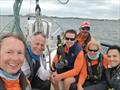 © Stephen Cloutier Vento Solare's team collecting its finish-line champagne in the 2020 Ida Lewis Distance Race IN BAY event © Stephen Cloutier