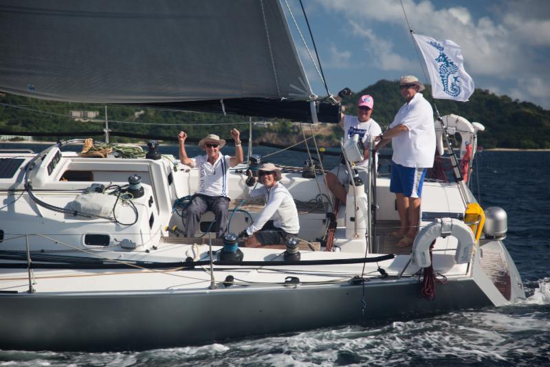 Nigel Passmore's J133, Apollo 7 crosses the finish line of the RORC Transatlantic Race photo copyright Arthur Daniel & Orlando K Romain / RORC taken at  and featuring the J133 class