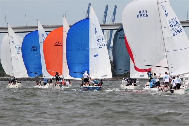 A tight grouping of J/24 sloops sails downwind toward the Ravenell Bridge during Saturday's racing - 2021 Charleston Race Week - Day 2 photo copyright Willy Keyworth taken at Charleston Yacht Club and featuring the J/24 class