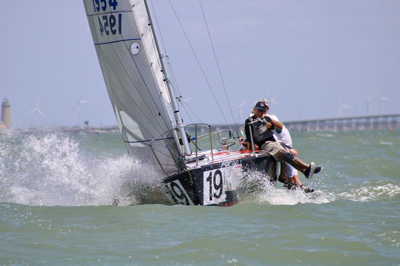 2022 J24 World Championship - Day 1 photo copyright Emily Stokes taken at Corpus Christi Yacht Club and featuring the J/24 class