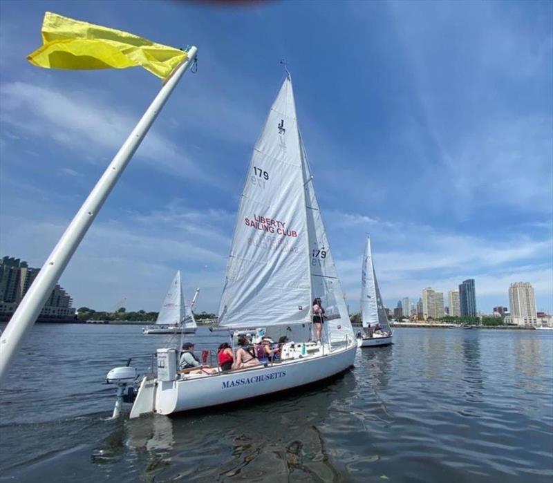 J/27 Massachusetts crosses the finish line in the 2024 Philadelphia Cup Regatta photo copyright Liberty Sailing Club taken at Liberty Sailing Club and featuring the J/27 class