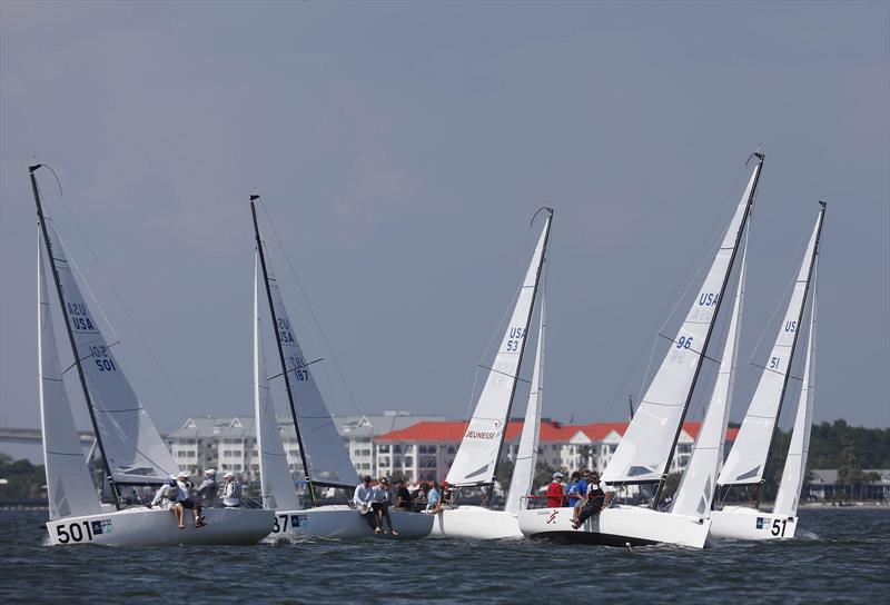The J/70 fleet splits tacks racing in the shadow of the Ravenel Bridge at Sperry Charleston Race Week photo copyright Charleston Race Week / Tim Wilkes taken at Charleston Yacht Club and featuring the J70 class