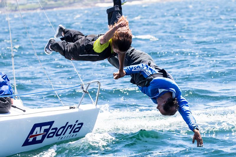 Claudia & Alberto Rossi go for a victory swim at the J70 European Championships - photo © María Muiña / www.sailingshots.es