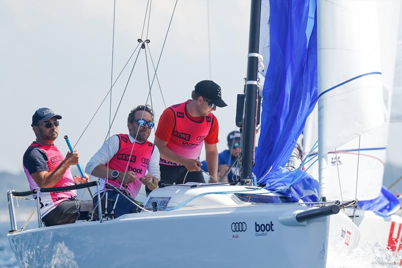 Danish J/70 crew of Bo Bøje Pedersen will change to blue jerseys (2nd overall) for the final day at Kiel Week photo copyright ChristianBeeck.de / Kieler Woche taken at Kieler Yacht Club and featuring the J70 class