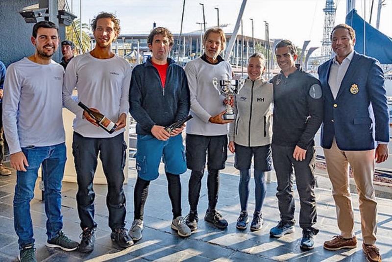 `Noticia`, took the second position in the winter series and 5th series. From left to right: Ángel Blazquez (Bodegas Can Marlés), Edu Reguera, Jon Larrazabal, Luis Martín Cabiedes, María Monràs, Alberto Pabrón, and Pablo Garriga as Commodore of the RCNB - photo © barcelonawinterseries.com