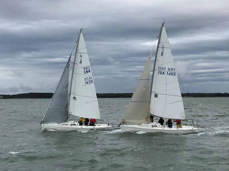 J/80s Dark and Stormy II and Traffic Jam in a tight finish on day 2 of the LTSC Solent Circuit photo copyright Robin Milledge taken at Lymington Town Sailing Club and featuring the J80 class