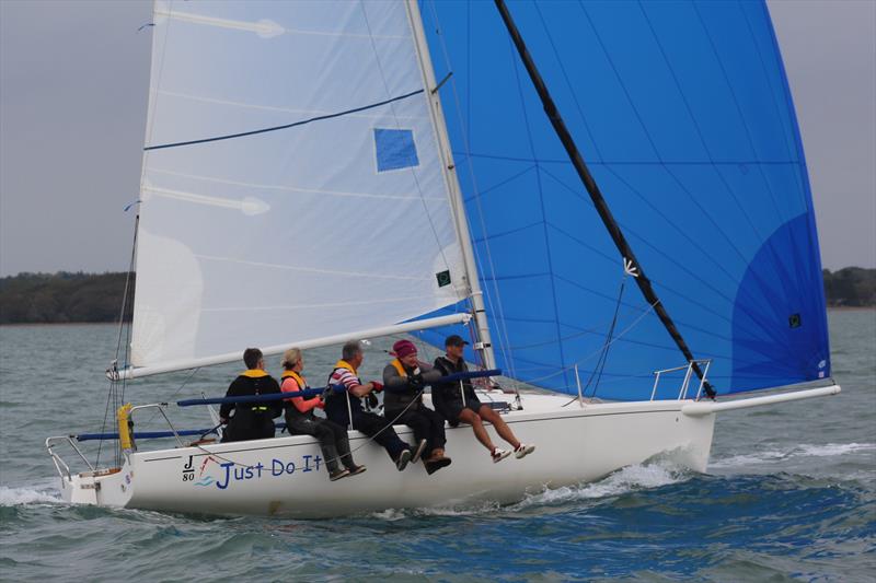 The crew of J80 ‘Just Do It' enjoy perfect Solent sailing conditions during Lymington Town Sailing Club Solent Circuit Race 1 photo copyright Lou Johnson taken at Lymington Town Sailing Club and featuring the J80 class