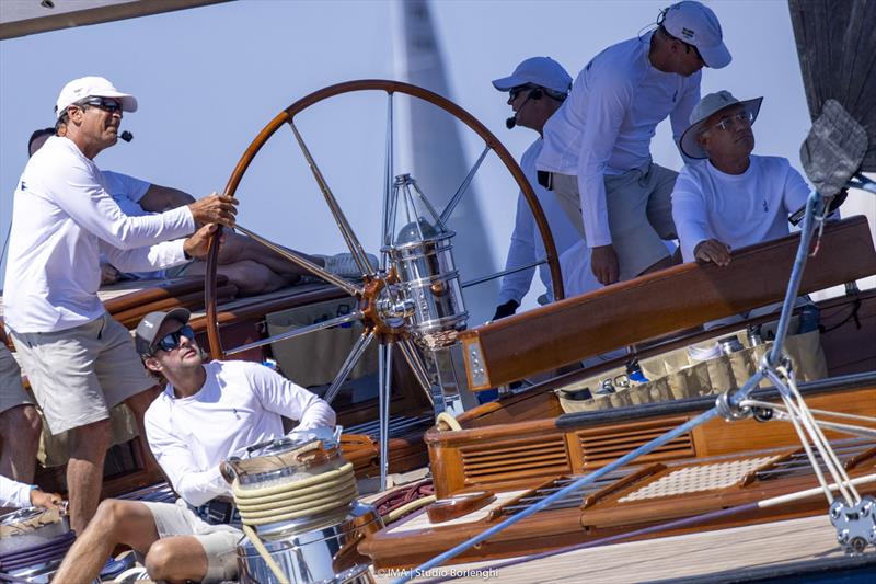 Peter Holmberg at the giant wheel on the magnificent J Topaz on day 2 of the Maxi Yacht Rolex Cup photo copyright IMA / Studio Borlenghi taken at Yacht Club Costa Smeralda and featuring the J Class class