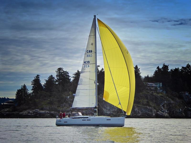 Gordon Wylie's Miles, a Jeanneau Sun Odyssey 439, carries her kite into the Pacific Ocean's open waters photo copyright Vic-Maui Race taken at Royal Vancouver Yacht Club and featuring the Jeanneau class