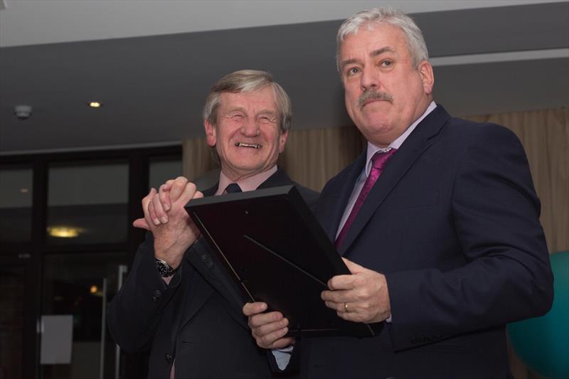 Jim Saltonstall, JMST Trustee (left) presents Ian Atkins (right) with his retirement donation photo copyright JMST taken at  and featuring the John Merricks Sailing Trust class