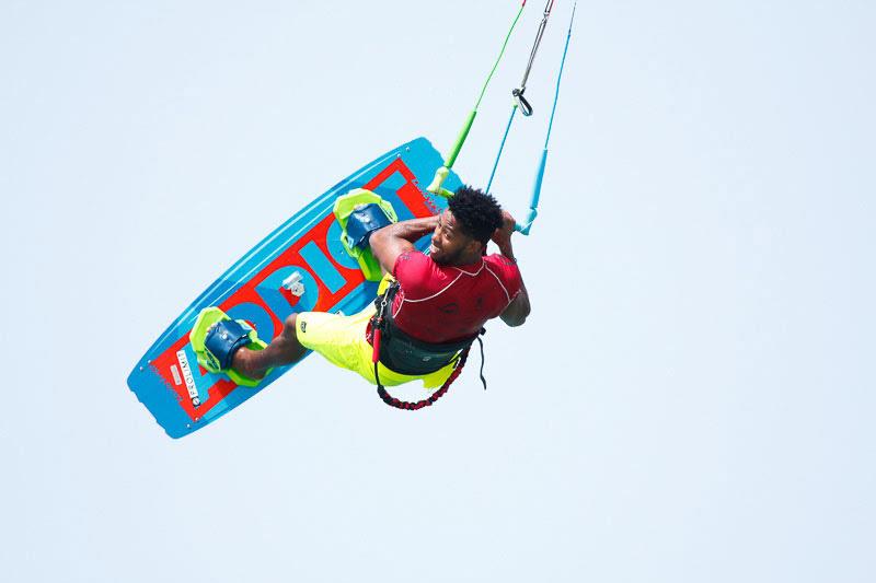 Posito Martinez smiling on the job in Cabarete photo copyright Genesis Reyes taken at  and featuring the Kiteboarding class