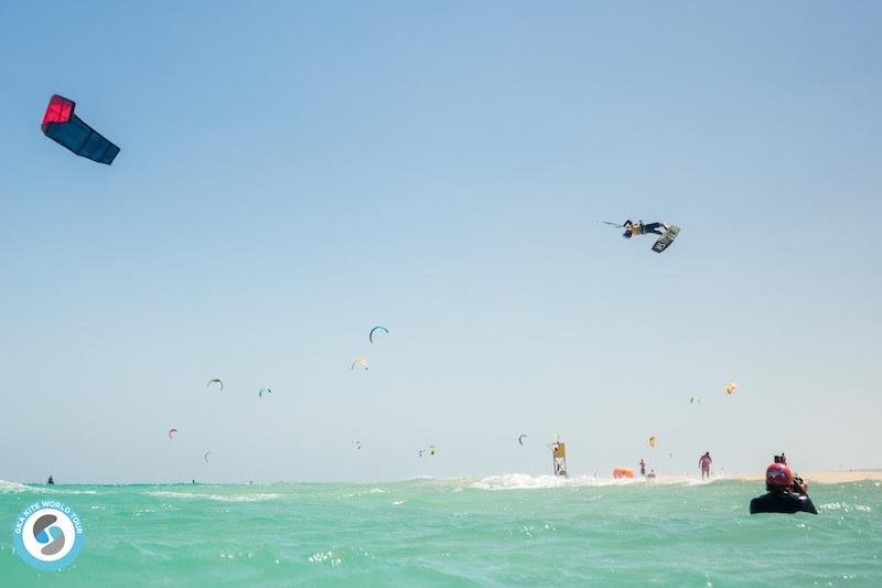 Oswald Smith trying to get level with that kite in round two - 2019 GKA Freestyle World Cup Fuerteventura photo copyright Svetlana Romantsova taken at  and featuring the Kiteboarding class