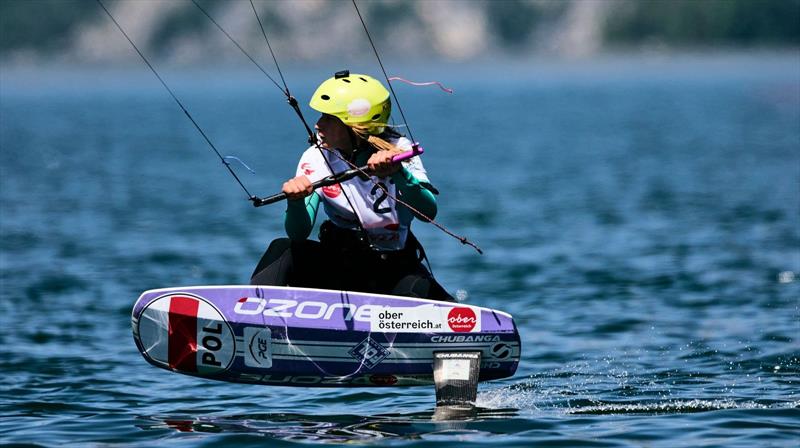 Julia Damasiewicz searching for the next gust - 2022 KiteFoil World Series Traunsee, Day 3 photo copyright IKA Media / Robert Hajduk taken at  and featuring the Kiteboarding class