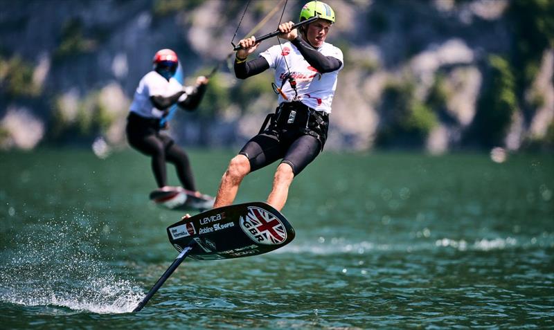 Guy Bridge (GBR) leads Max Maeder (SGP) in a close duel - 2022 KiteFoil World Series Traunsee, Day 3 photo copyright IKA Media / Robert Hajduk taken at  and featuring the Kiteboarding class