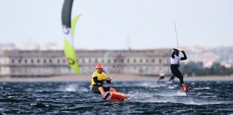 Toni Vodisek staying ahead of the masked Max Maeder - 2022 Formula Kite World Championships, day 4 photo copyright Robert Hajduk / IKA media taken at  and featuring the Kiteboarding class