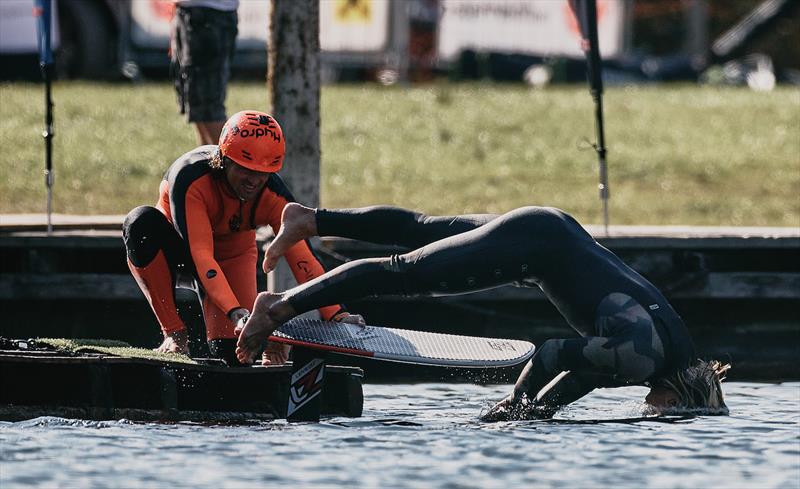 But Jannis Maus DOES give his hair a wash during the pump foil contest - 2023 KiteFoil World Series Austria day 3 - photo © IKA Media / Robert Hajduk