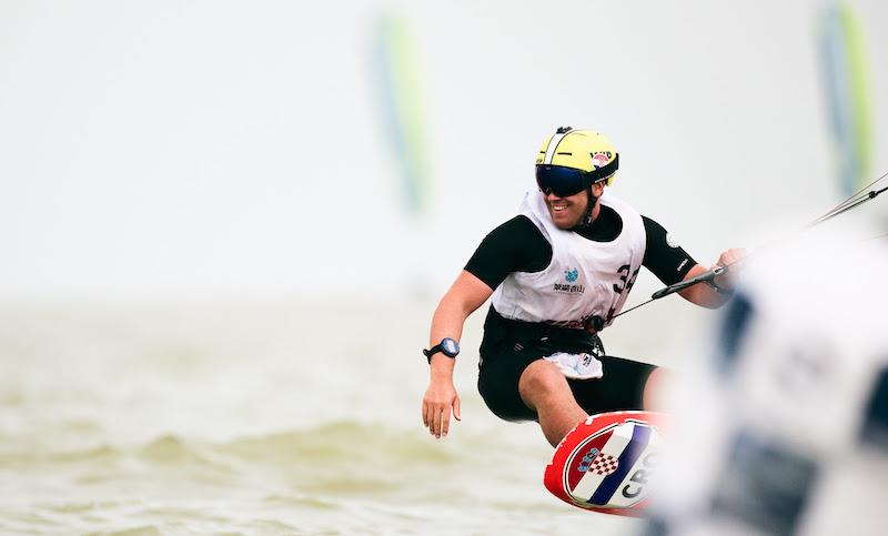 Martin Dolenc grins his away to another great finish - 2023 KiteFoil World Series Final in Zhuhai, Day 3 photo copyright IKA Media / Robert Hajduk taken at  and featuring the Kiteboarding class