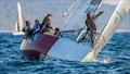 The fine art of balance. Sakhile Mthombeni multitasks as he loads the pole in preparation to hoist the spinnaker as Anna Correa powers the L26, Element around the top mark. 28 yachts from around South Africa have been battling it out offshore of Durban &copy; Chris Clark