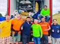The team loading the container at Queen Mary Sailing Club