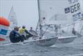 Bow to bow duel between the leading Italian Lorenzo Brando Chiavarini and Philipp Buhl after the ILCA 7 rounded the buoys at Kieler Woche