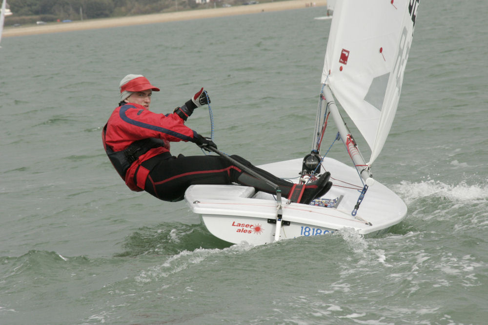 Laser ales - Orlondo Gledhill probably needed something stronger to keep out the cold during the Stokes Bay Laser qualifier photo copyright Eddie Mays taken at Stokes Bay Sailing Club and featuring the ILCA 7 class