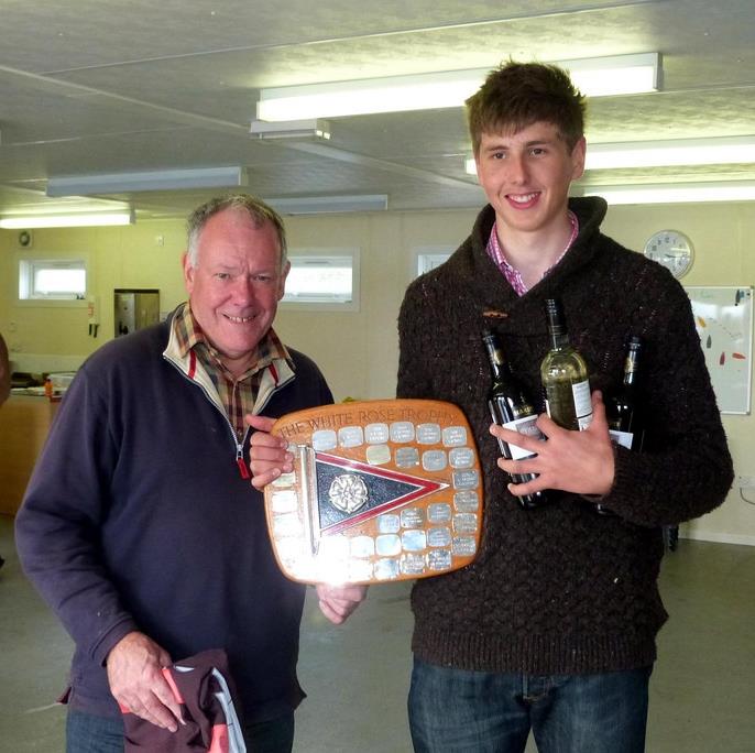 Winner Hector Simpson receives the trophy from commodore Roger Perry after the Laser Northern Grand Prix event held at West Riding photo copyright John Wadsworth taken at West Riding Sailing Club and featuring the ILCA 7 class