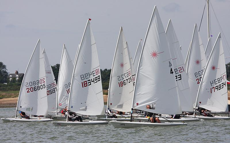 Day 1 of Zhik Pyefleet Week at Brightlingsea photo copyright Fiona Brown / www.fionabrown.com taken at Brightlingsea Sailing Club and featuring the ILCA 7 class