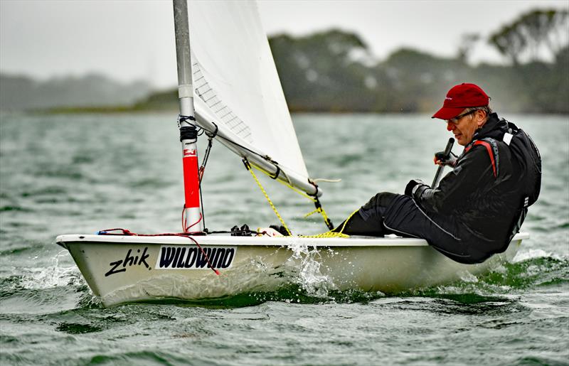 'Wildwind' and a down pour did not stop Ian Payne in his Laser taking part in the Chichester Yacht Club Regatta photo copyright Chris Hatton Photography taken at Chichester Yacht Club and featuring the ILCA 7 class