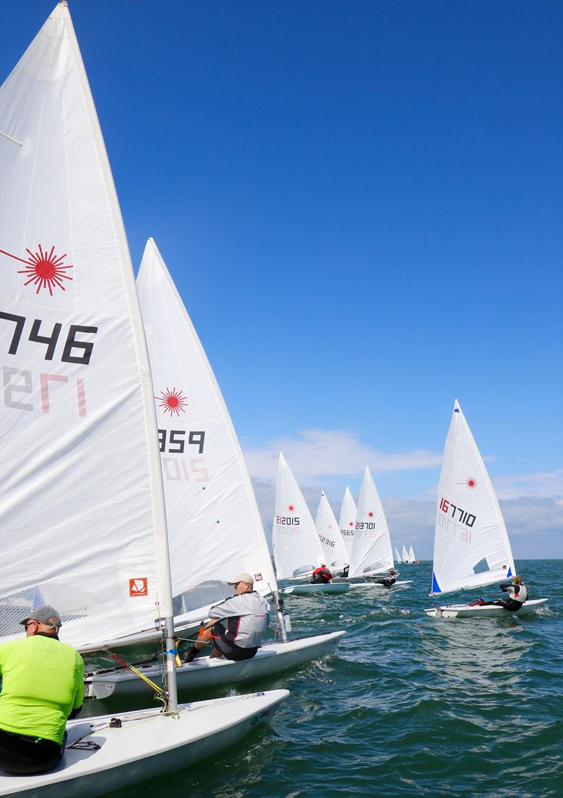 Olly Cage-White has clear air from a mid-line start as does 1st lady sailor Abby Zambinski (167710) during Laserfest 2019 at Whitstable photo copyright Nicky Whatley taken at Whitstable Yacht Club and featuring the ILCA 7 class