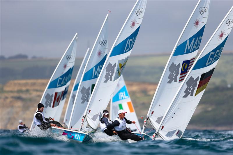 Laser racing on day seven of the London 2012 Olympic Sailing Competition photo copyright Tom Gruitt / www.tom-gruitt.co.uk taken at Weymouth & Portland Sailing Academy and featuring the ILCA 7 class