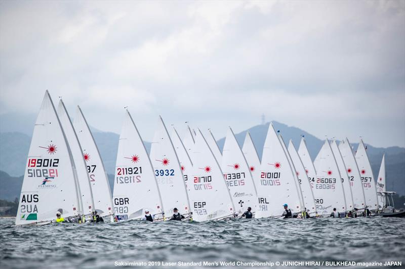 Start line on day 5 of the ILCA Laser Standard Men's World Championship photo copyright Junichi Hirai / Bulkhead Magazine Japan taken at  and featuring the ILCA 7 class