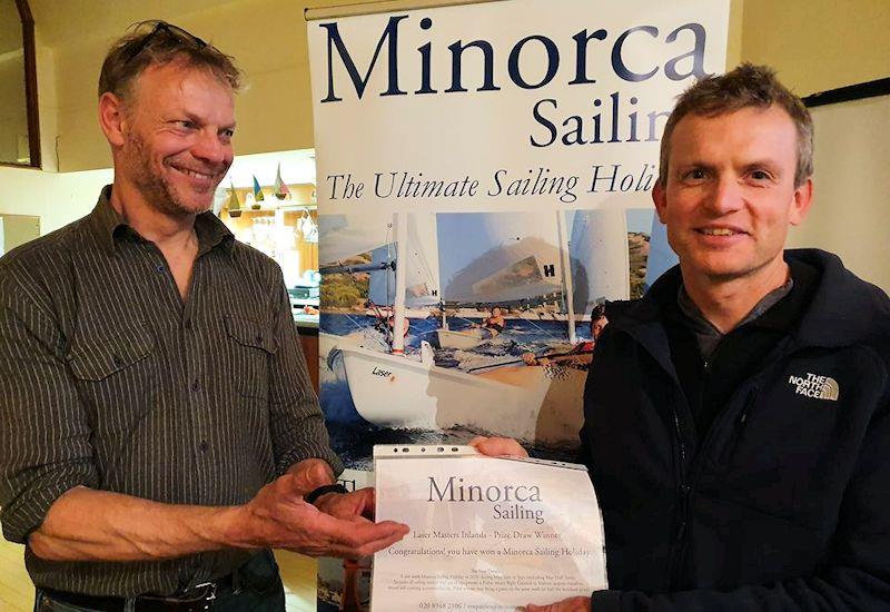 Neil Peters presents John Curran with the Minorca Sailing Prize during the Laser Masters Inland Championships photo copyright Guy Noble taken at Rutland Sailing Club and featuring the ILCA 7 class