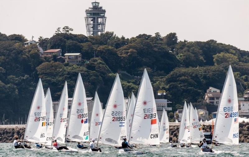 Laser fleet - photo © World Sailing