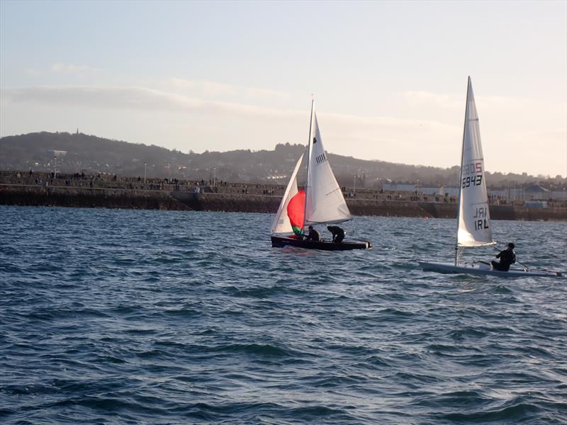 Ciara Mulvey & Peter Murphy (GP14 11111) drop their spinnaker approaching the leeward mark as Dun Laoghaire Frostbite Series 2 gets underway photo copyright Cormac Bradley taken at Dun Laoghaire Motor Yacht Club and featuring the ILCA 7 class