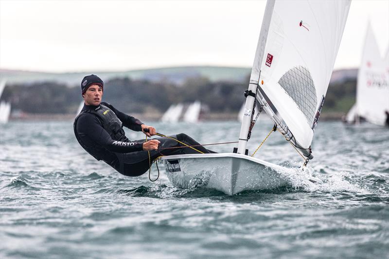 Micky Beckett at Weymouth in 2021 photo copyright PHOTOBOAT.co.uk taken at Weymouth & Portland Sailing Academy and featuring the ILCA 7 class