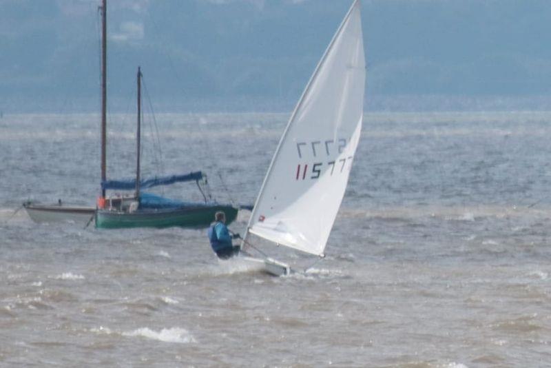 Andy Bell finishes second in heavy weather in Race 2 - West Kirby Festival of Sailing photo copyright Alan Jenkins taken at West Kirby Sailing Club and featuring the ILCA 7 class