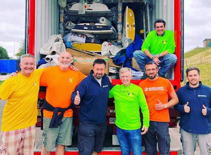 The team loading the container at Queen Mary Sailing Club photo copyright Guy Noble taken at Queen Mary Sailing Club and featuring the ILCA 7 class