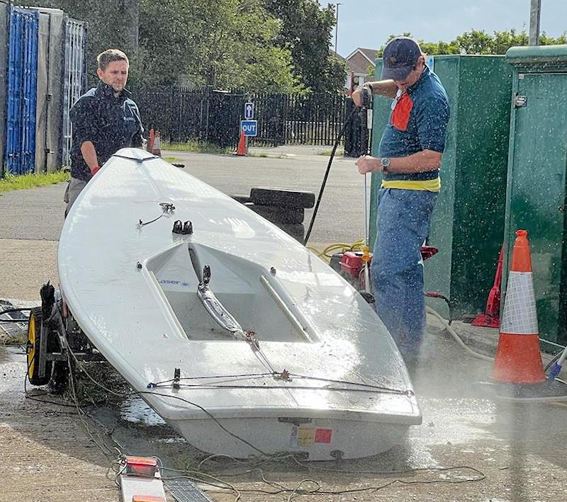 Cleaning off an ILCA - photo © QMSC